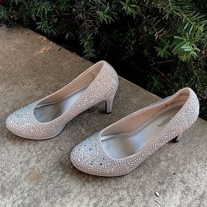 These are heels slightly worn, size 7